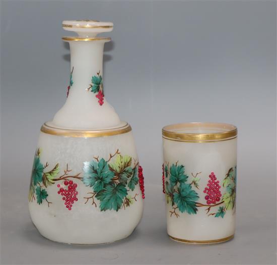 A Bohemian enamelled frosted glass decanter and matching beaker